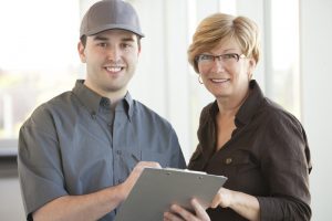 service technician reviewing information with customer